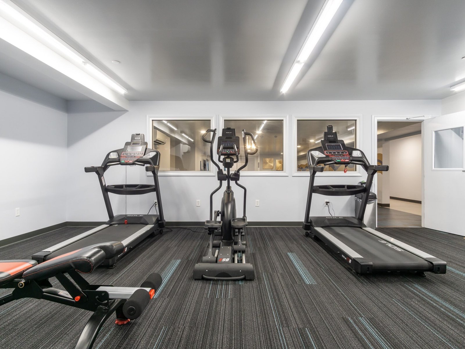 Premium amenities Grand Monarch fitness center and lounges